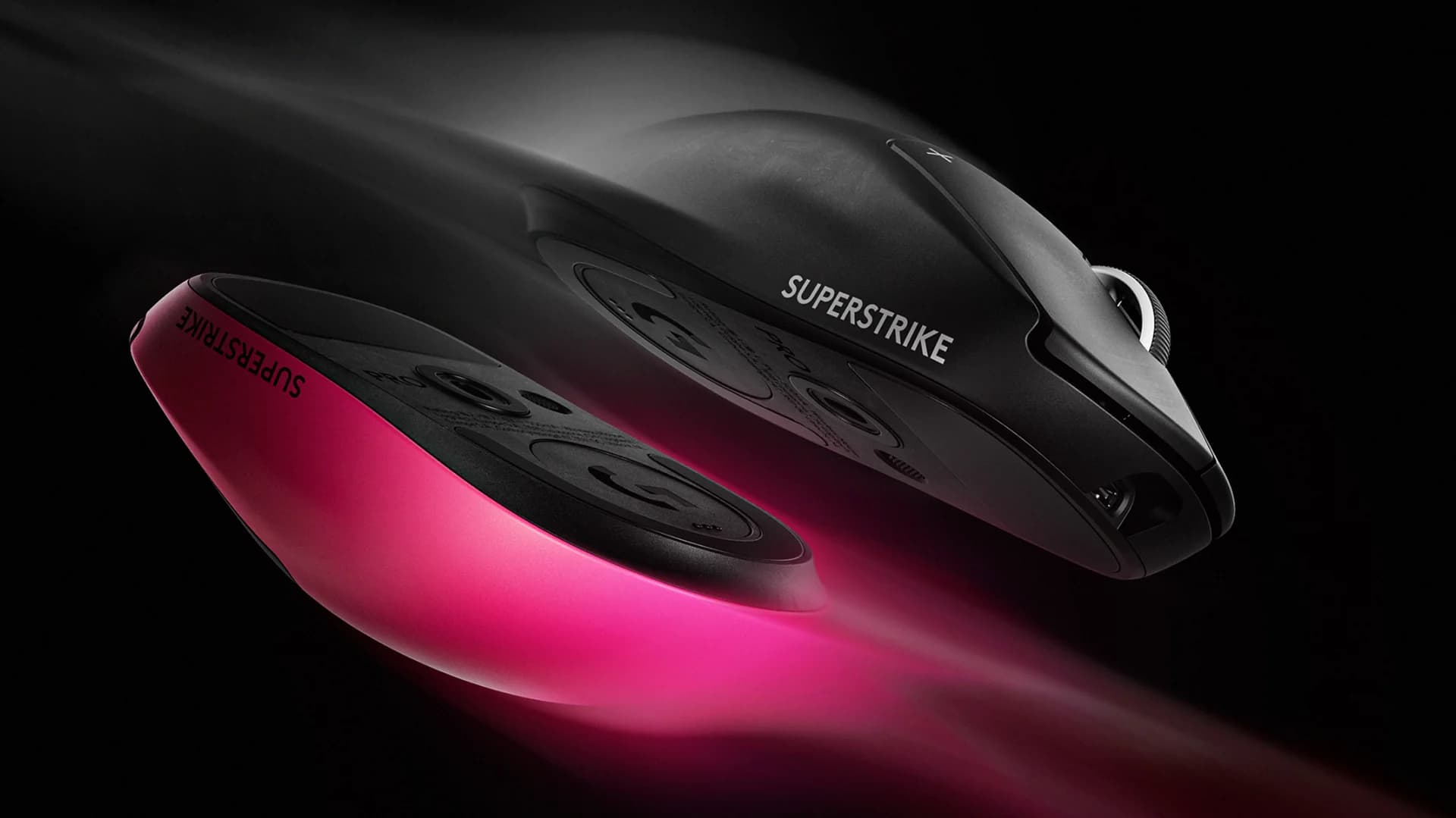 Two PRO X3 SUPERSTRIKE mice, black and magenta, seen from the base