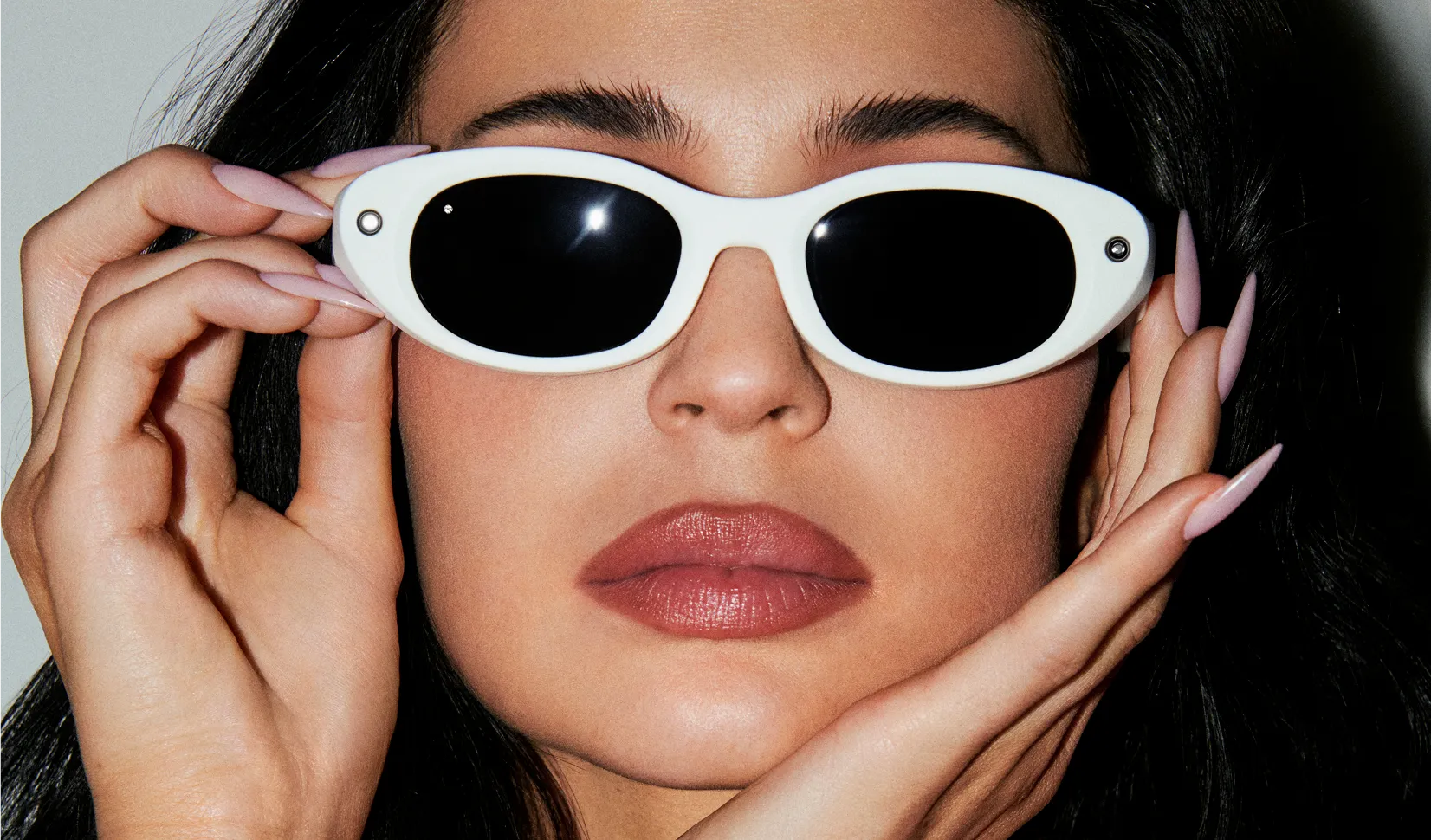 Kylie Jenner wearing Meta Starfire Kylie Edition with an Ivory frame and Black lenses