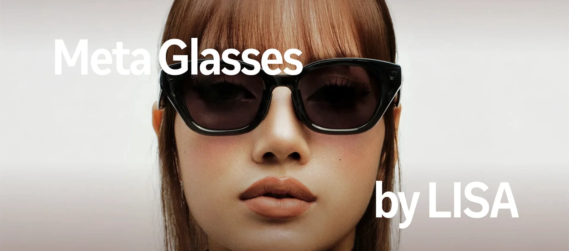 Close-up of LISA wearing Meta Capri LISA Edition with the text Meta Glasses by LISA